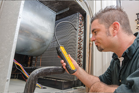 man performing Indoor Air Quality Testing in Fairfax, Arlington, VA, Baltimore, Sterling, VA, Reston, Falls Church, VA and Surrounding Areas