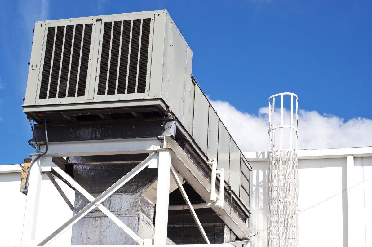 Commercial HVAC Duct Cleaning on the roof of a building in Manassa